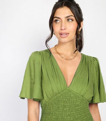 Little Mistress by Chloe Lewis Green Shirred Frilly Hem Mini Dress 3 Little Mistress by Chloe Lewis Green Shirred Frilly Hem Mini Dress