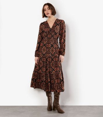 Apricot Black Empire Line Smocked Printed Dress