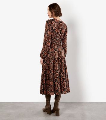 Apricot Black Empire Line Smocked Printed Dress