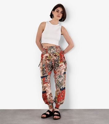 Apricot Orange Patchwork Print Trousers