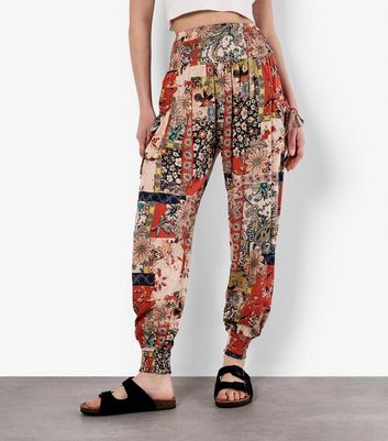 Apricot Orange Patchwork Print Trousers