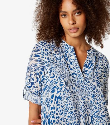 Apricot Blue Animal Print Asymmetric Hem Top