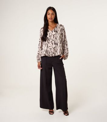 Blue Vanilla Cream Animal Print Puffball Hem Top