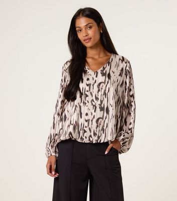 Blue Vanilla Cream Animal Print Puffball Hem Top 3 Blue Vanilla Cream Animal Print Puffball Hem Top