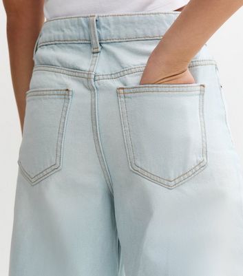 Girls Light Blue Busted Knee Super Wide Leg Jeans 5 Girls Light Blue Busted Knee Super Wide Leg Jeans